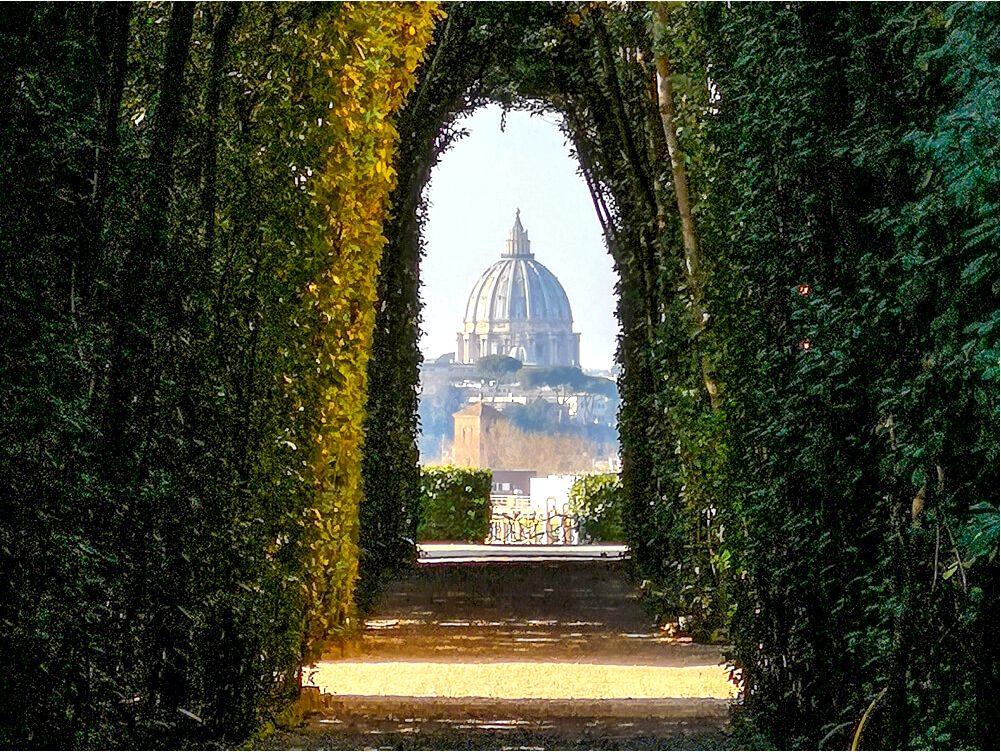 Gate of the priory of the Knights of Malta Keyhole near Orange Garden, Rome, Italy